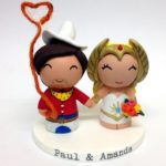 Adorable She-Ra and Pecos Bill Wedding Cake Topper