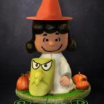 Cute Lucy’s Witch Halloween Costume Cake
