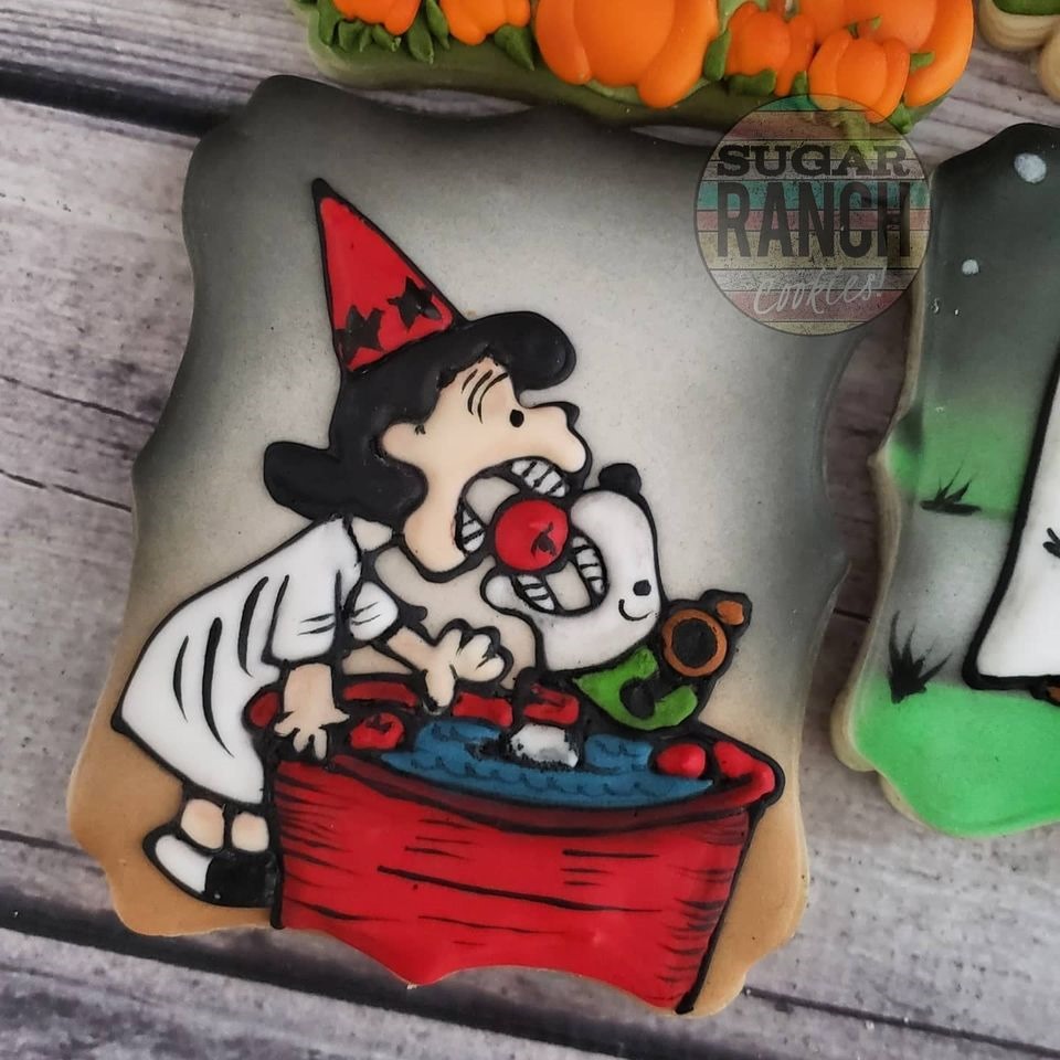 Snoopy and Lucy bobbing for apples Snoopy and Lucy bobbing for apples