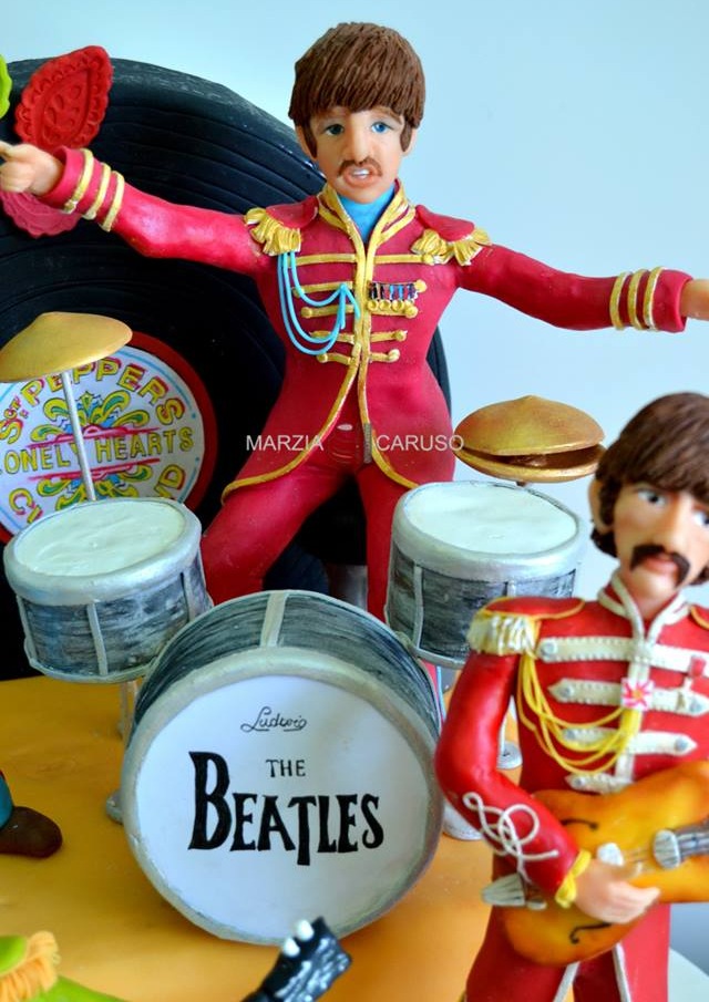 Beatles soiled with Cake