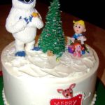 The Bumble Helps Decorate For Christmas Cake