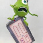 Monsters Inc Cake with Mike balancing on Boo;s Door