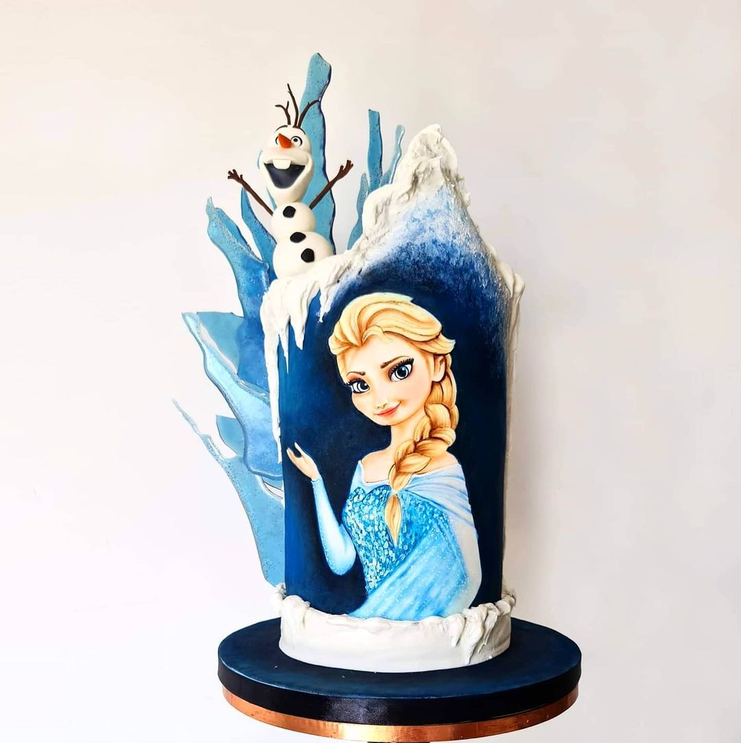 Hand-painted Elsa and Olaf Cake