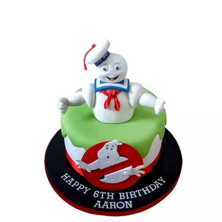 This 8th birthday cake has the no ghosts logo on the front and the Stay Puft Marshmallow Man on top