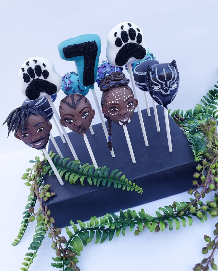 These Black Panther Cake Pops feature T'Challa, Shuri, Eric Kilmonger & Okoye