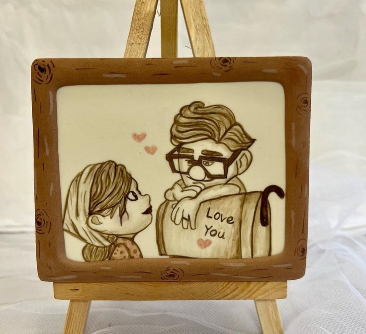 This cookie is a portrait of Carl & Ellie as newlyweds.