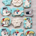 These cute cookies feature Frosty the Snowman and the little girl Karen playing together in the snow.