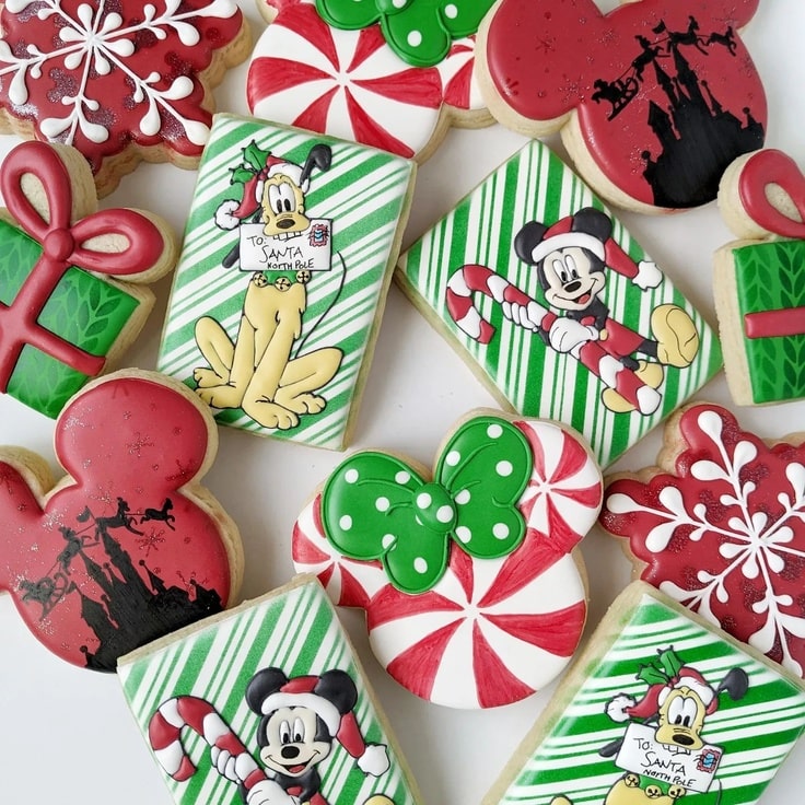 Cookies look like green wrapping paper with Mickey and Pluto on them.