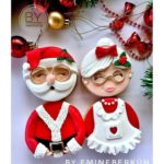 Four round cookies were used to make Santa & Mrs. Claus. One cookie each for the body and another for their heads.