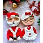 Four round cookies were used to make Santa & Mrs. Claus. One cookie each for the body and another for their heads.
