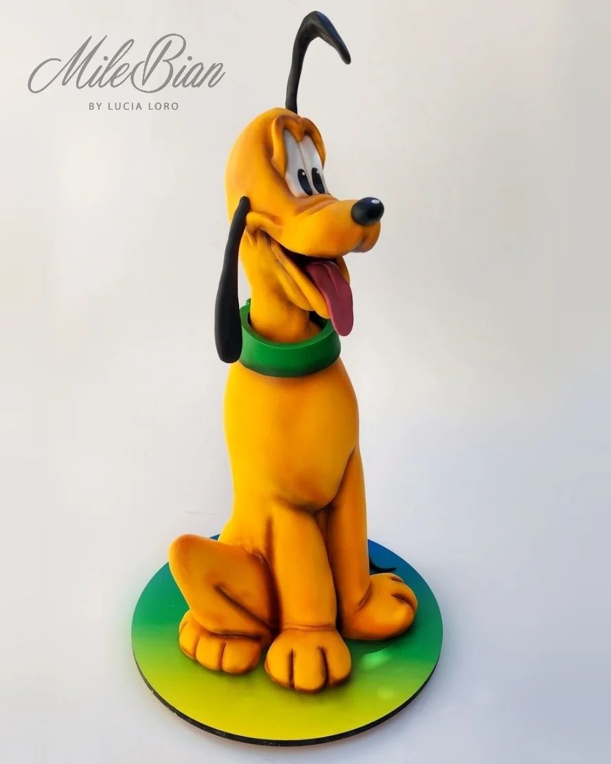 Pluto sculpted cake