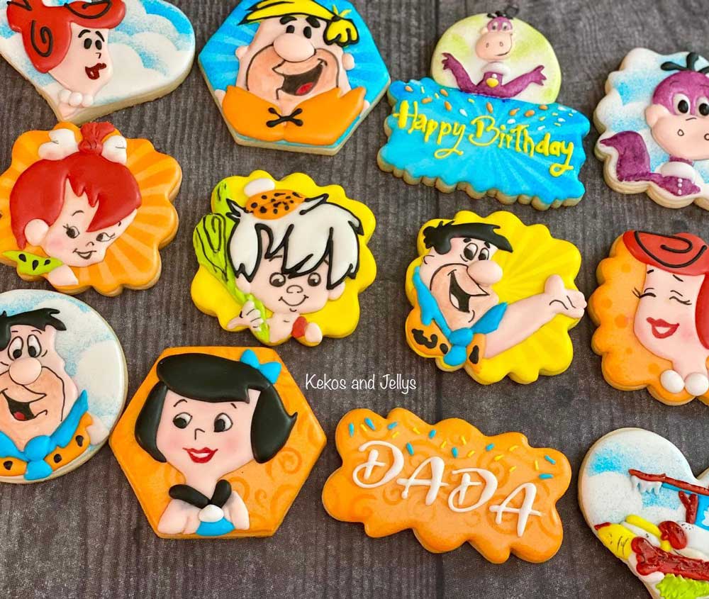 Yellow orange blue Flintstones birthday cookies