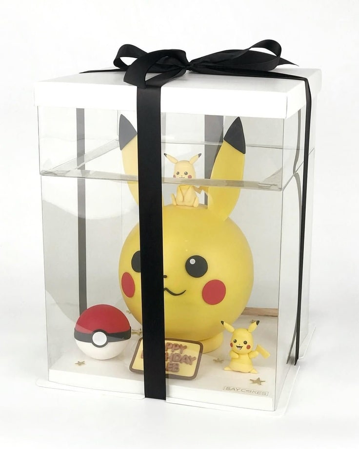 The Pikachu Bombshell is in a clear box which is decorated with a black ribbon.