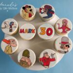 These hand painted Wacky Racers cupcakes feature eight of the characters from the cartoon.