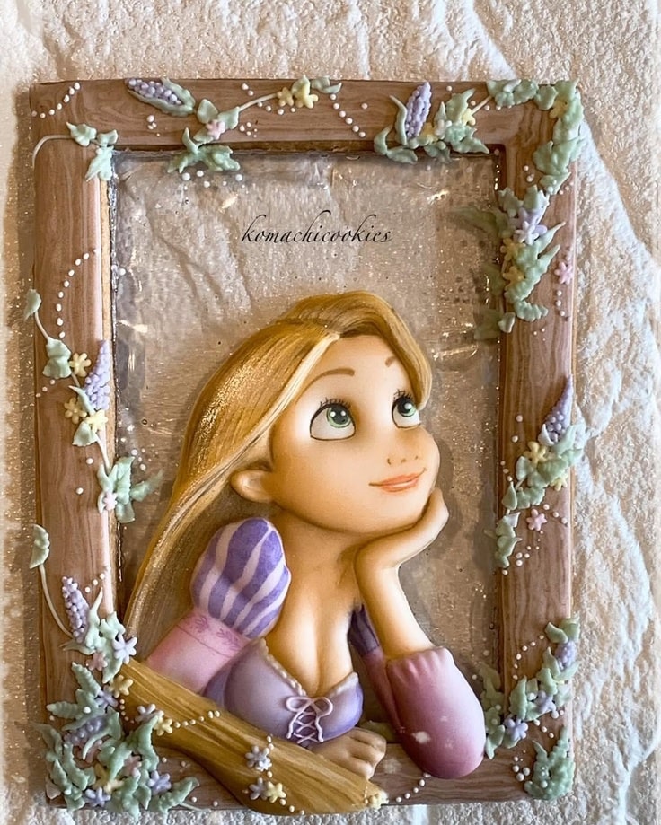 This amazing cookie is a picture frame with Rapunzel inside it