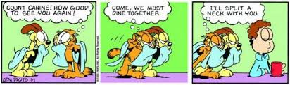 A Garfield comic where both Garfield and Odie use blue blankets to dress up as Dracula.