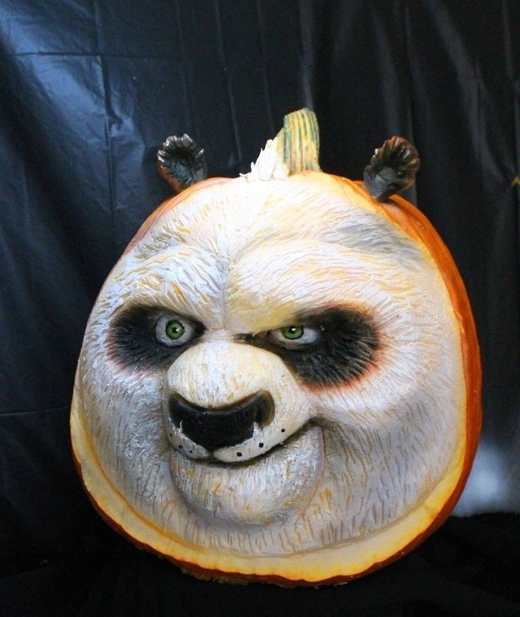 This gorgeous Kung Fu Panda pumpkin was carved so that he is 3-D. Then it was painted. His fur is white with black accents.